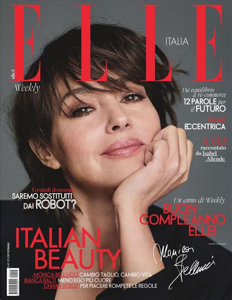 Italian beauty Monica Bellucci poses topless on the cover of ELLE